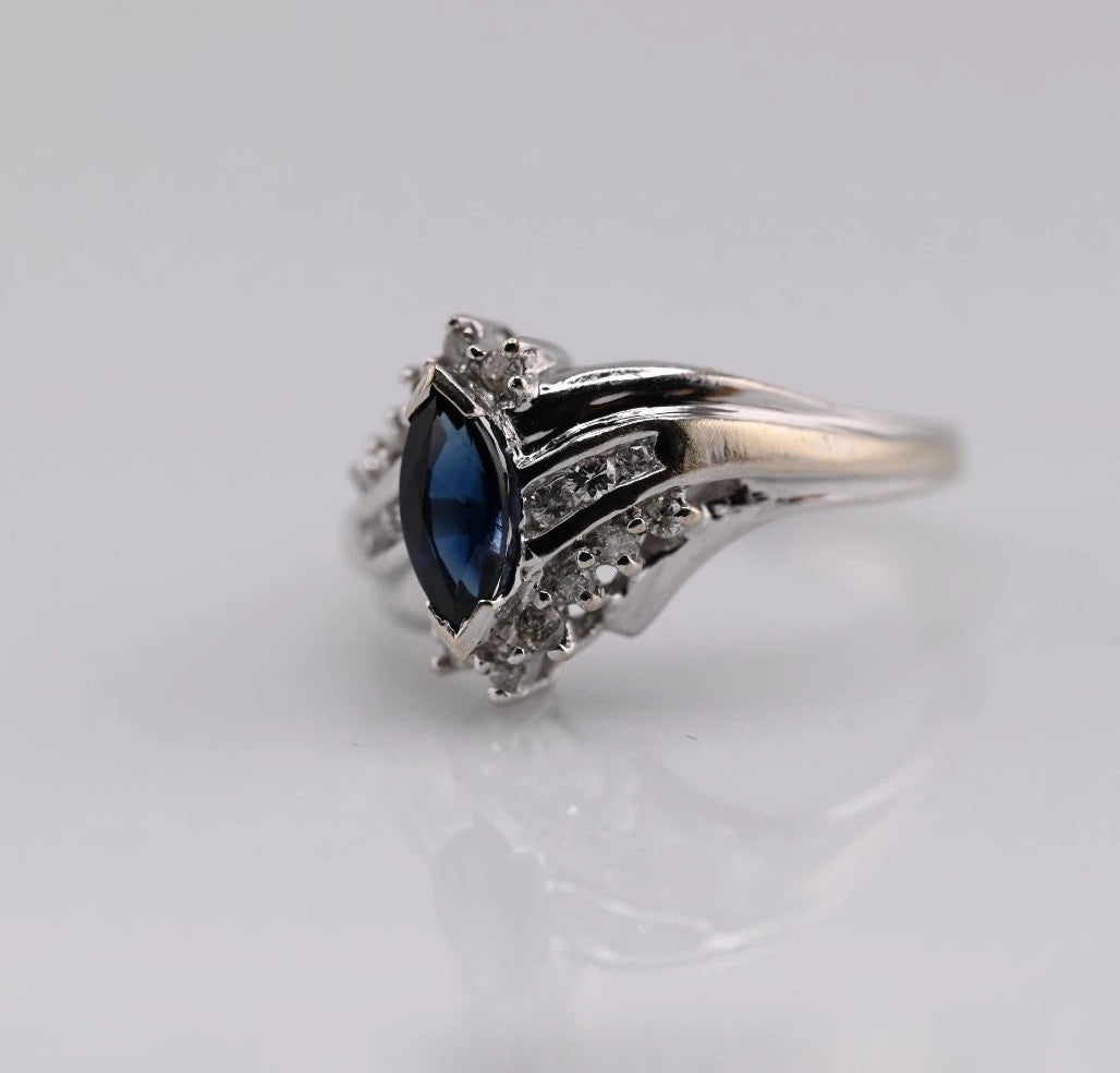 Marquise-cut Blue Sapphire Ring set in 14K White Gold with Diamond Accents6