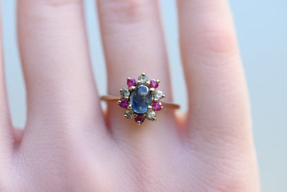 Elegant Antique / Vintage Natural Sapphire Ring with Halo of Rubies in .375 GTV3