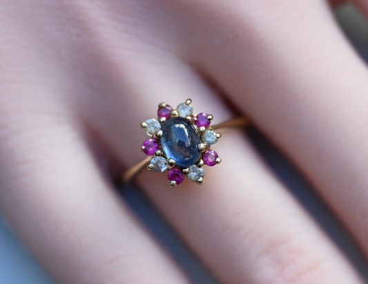Elegant Antique / Vintage Natural Sapphire Ring with Halo of Rubies in .375 GTV0