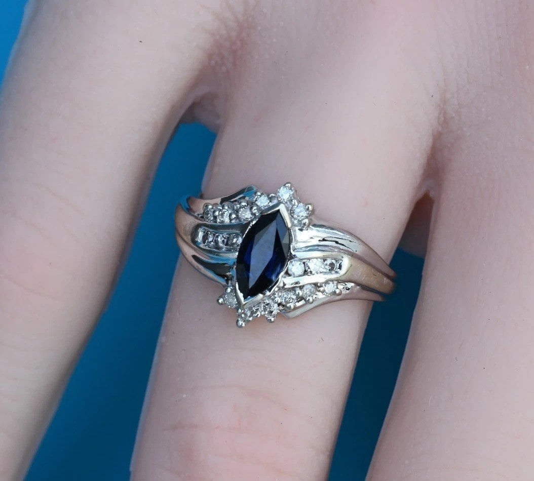 Marquise-cut Blue Sapphire Ring set in 14K White Gold with Diamond Accents0