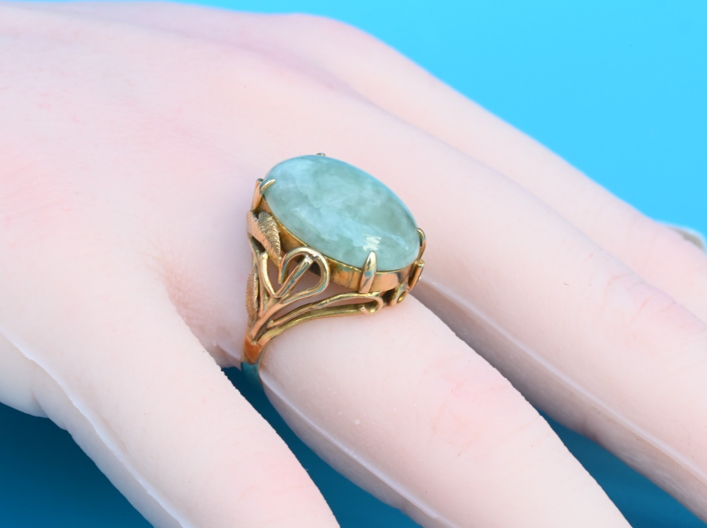 Lovely Muted Green Jade Cabochon set in a Decorative 14K Yellow Gold Mounting0