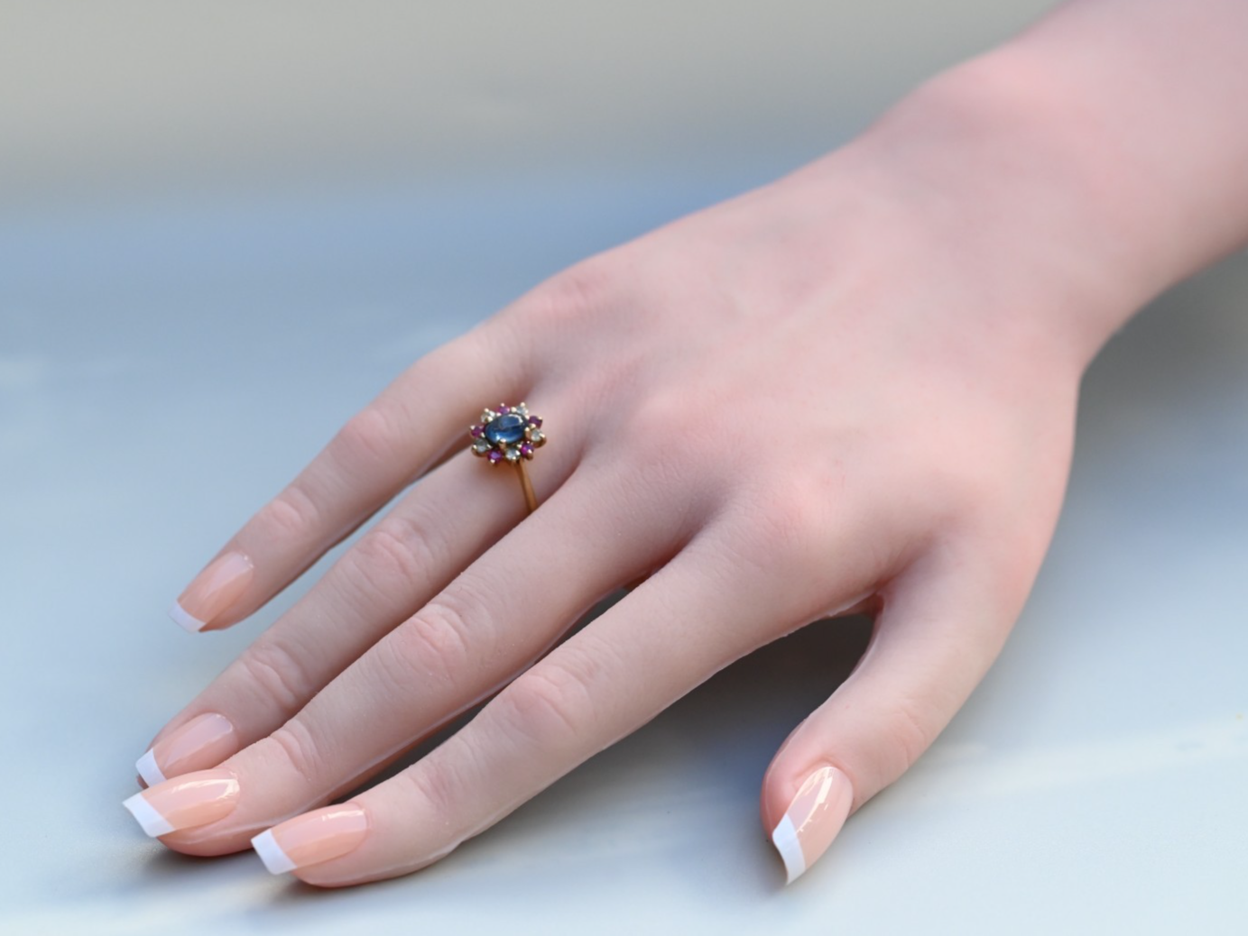 Elegant Antique / Vintage Natural Sapphire Ring with Halo of Rubies in .375 GTV5