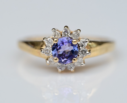High Quality Natural Tanzanite with Halo of Diamonds set in 14K Yellow Gold Ring0